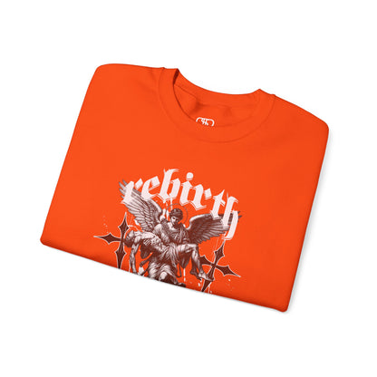 A folded orange Sweater featuring an Angel carrying a figure with "Rebirth" text, white and black gothic spiritual art apparel.