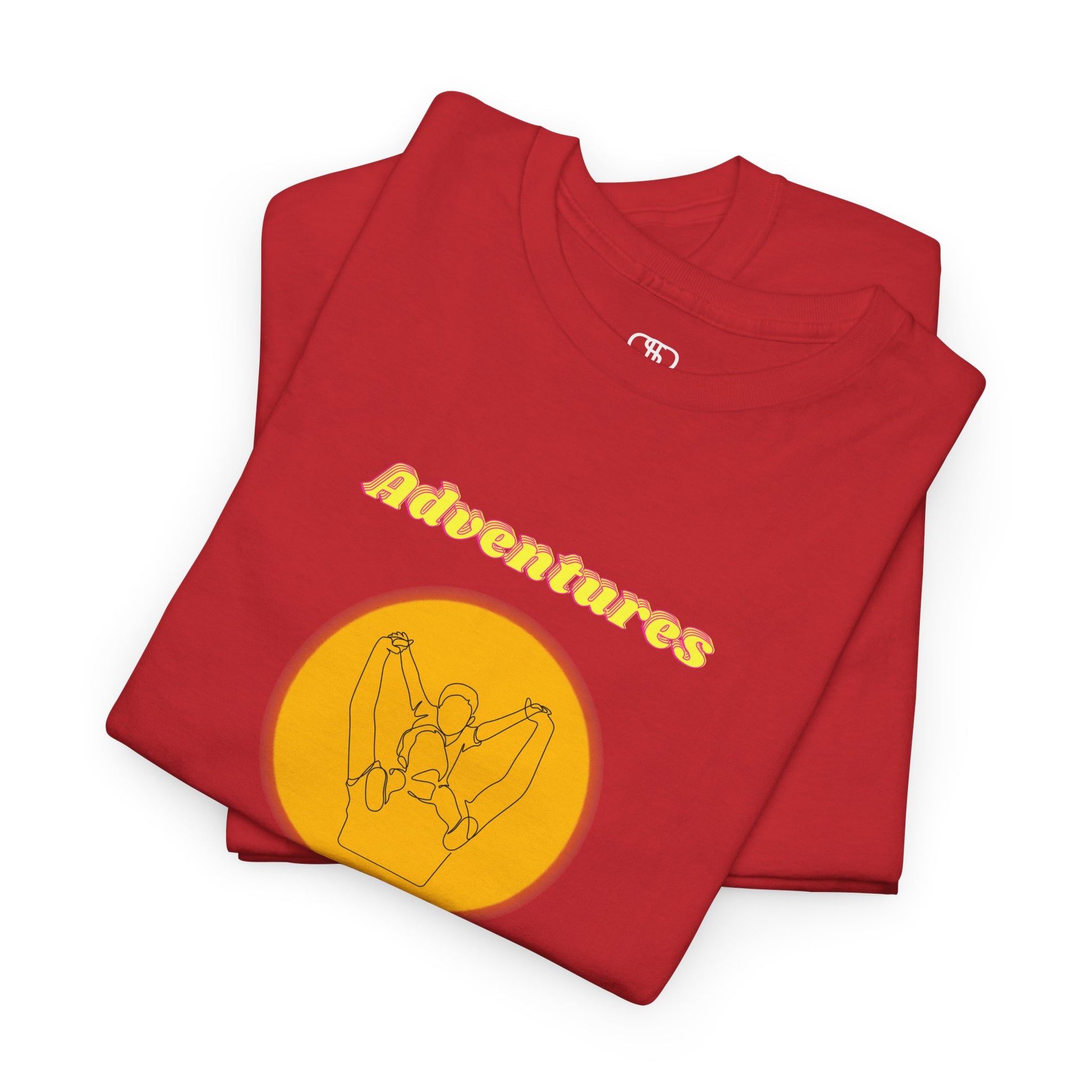 A folded red T-shirt with a graphic of a dad holding a child's hands on their shoulders and "Adventures With Dad" text.