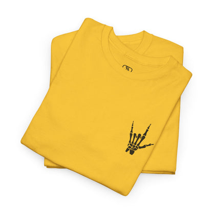 A FOLDED DAISY YELLOW t-shirt with small rock hand symbol on front, and "Rules.. Never Heard of Them" graffiti text on the back.