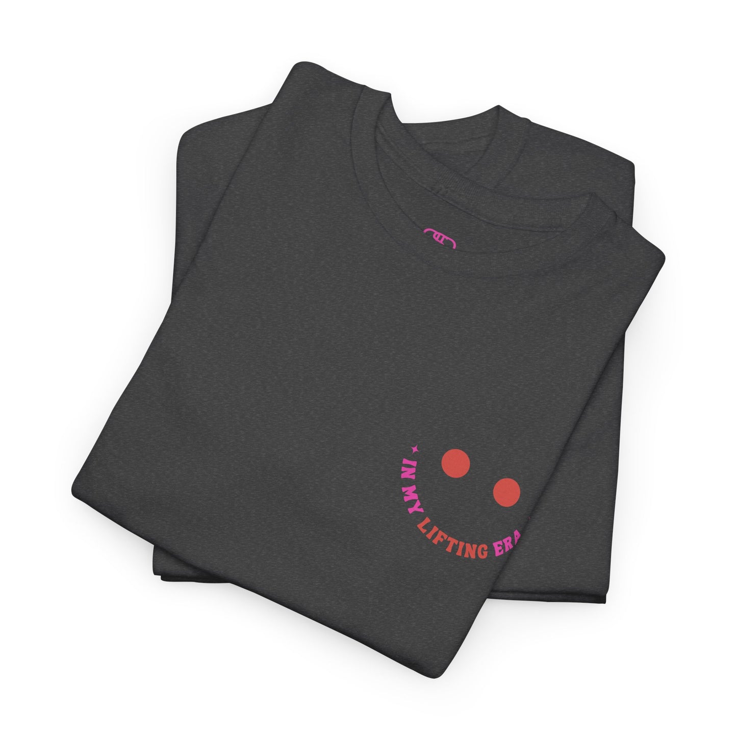 A folded dark heather t-shirt with a retro smiley face on the front and the phrase “In my lifting Era” in a creative retro design on the back.