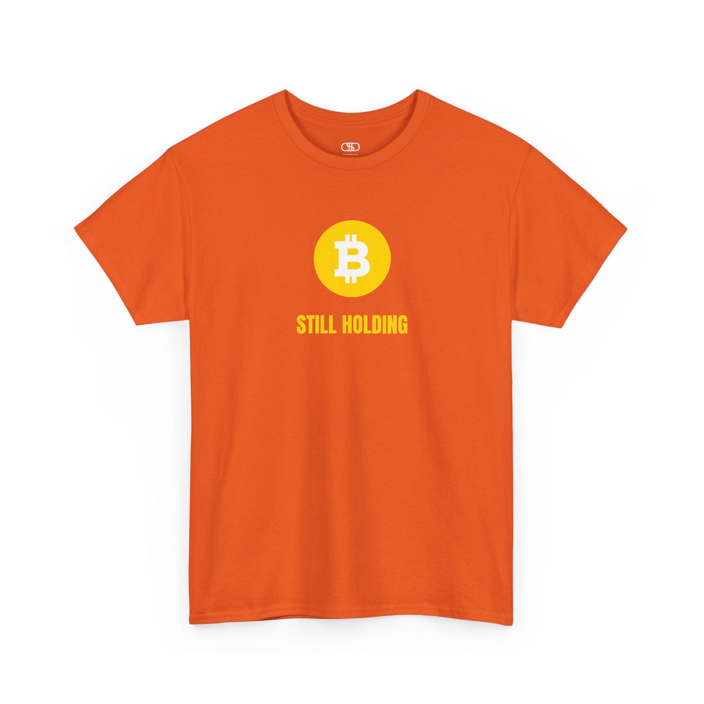 An orange  T-shirt with a Bitcoin emblem and "Still Holding" text in gold.