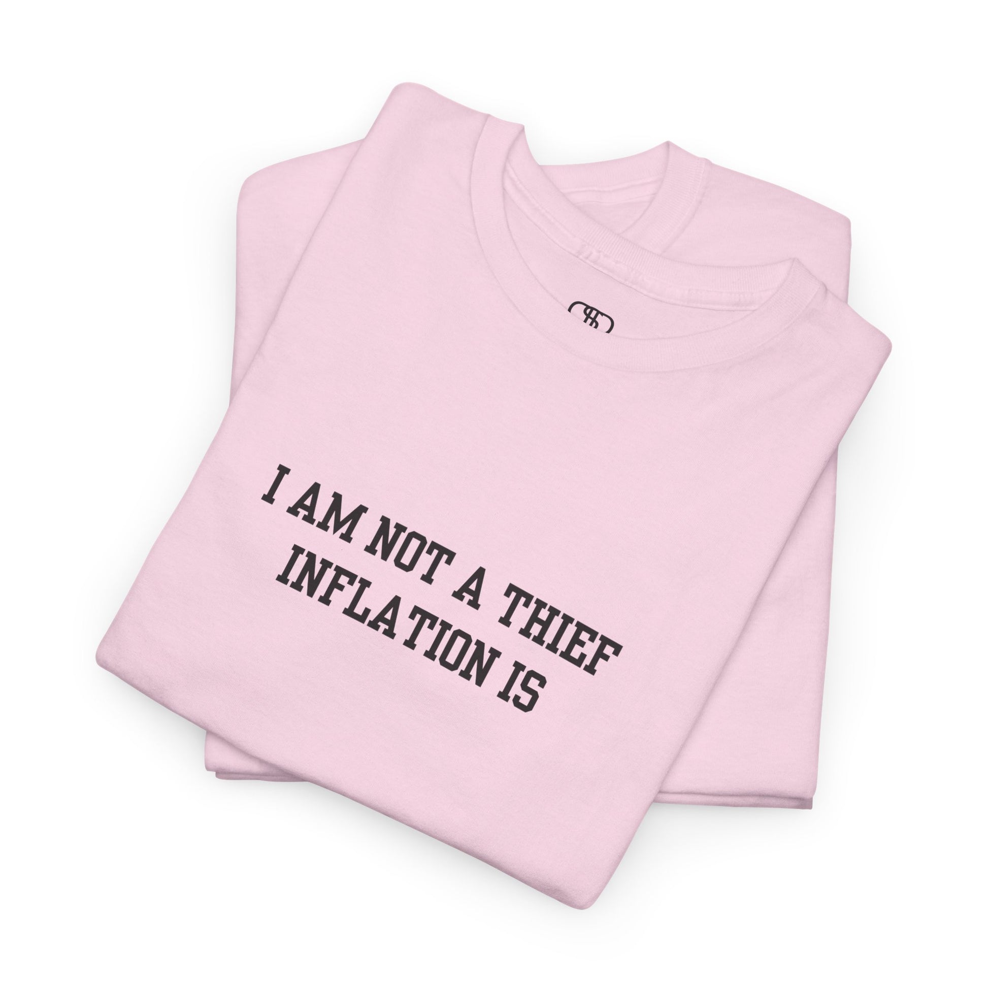 A light pink t-shirt with the phrase “I am not a thief Inflation is” on the front.