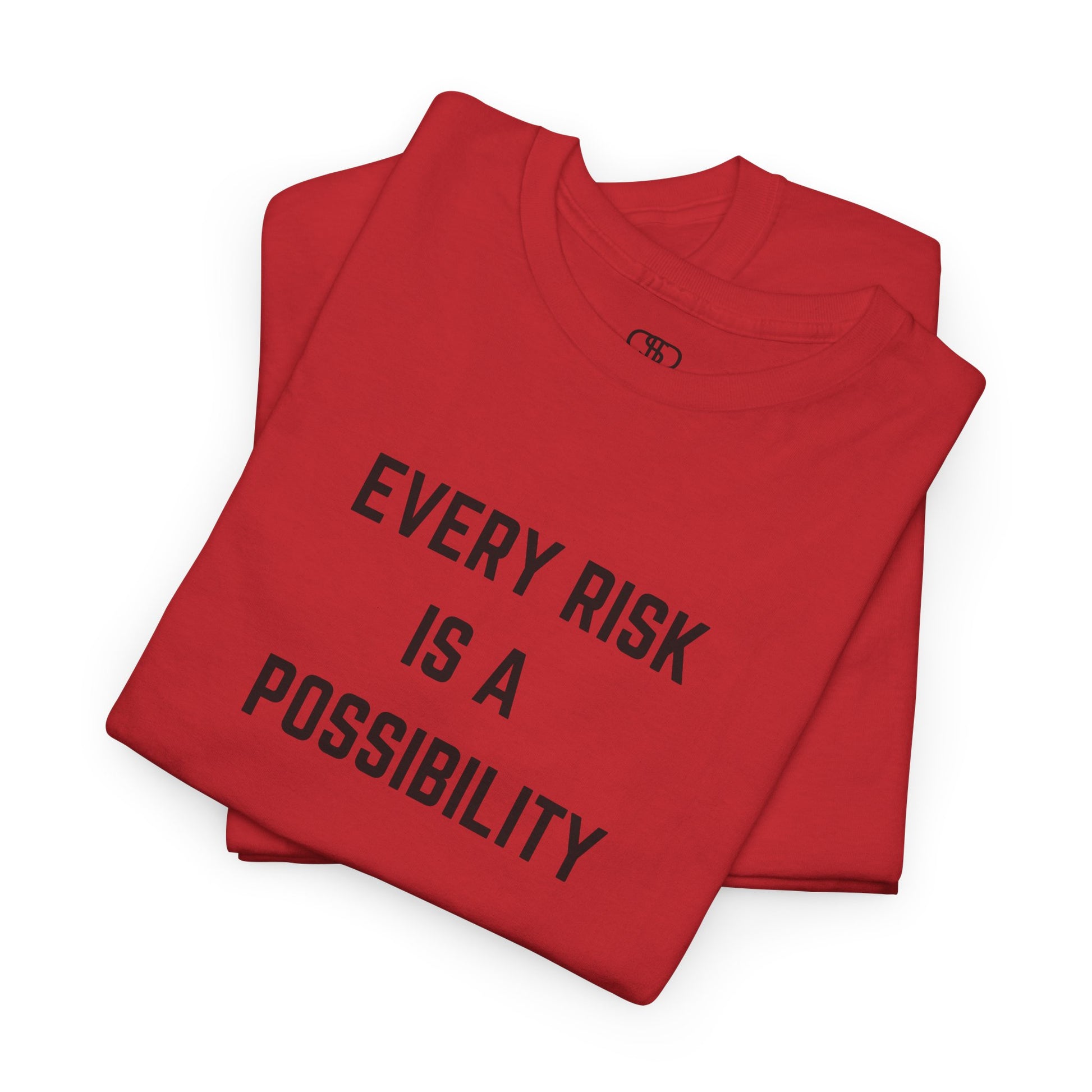  A t-shirt featuring the motivational quote "Every Risk Is a Possibility." in a clean, bold font.