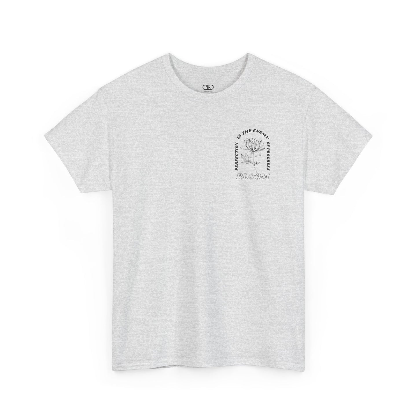 An [Ash gray] t-shirt with a central flower design and the words “Perfection is the enemy of progress” and “Bloom” underneath it the phrase "Consistent effort breeds greatness." 