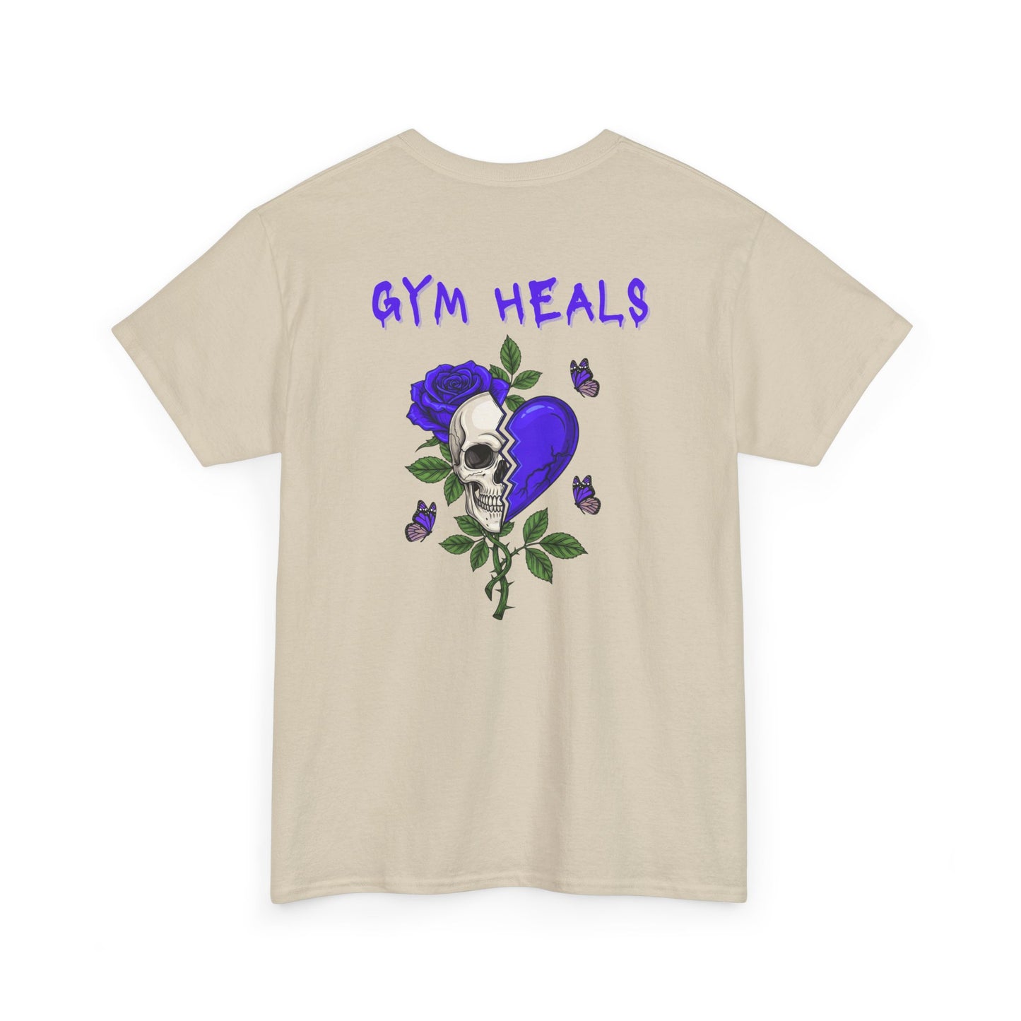 A sand t-shirt with a front design of a half skull, half broken purple heart, and a rose. The back reads "Gym Heals" along with a similar design found on the front.