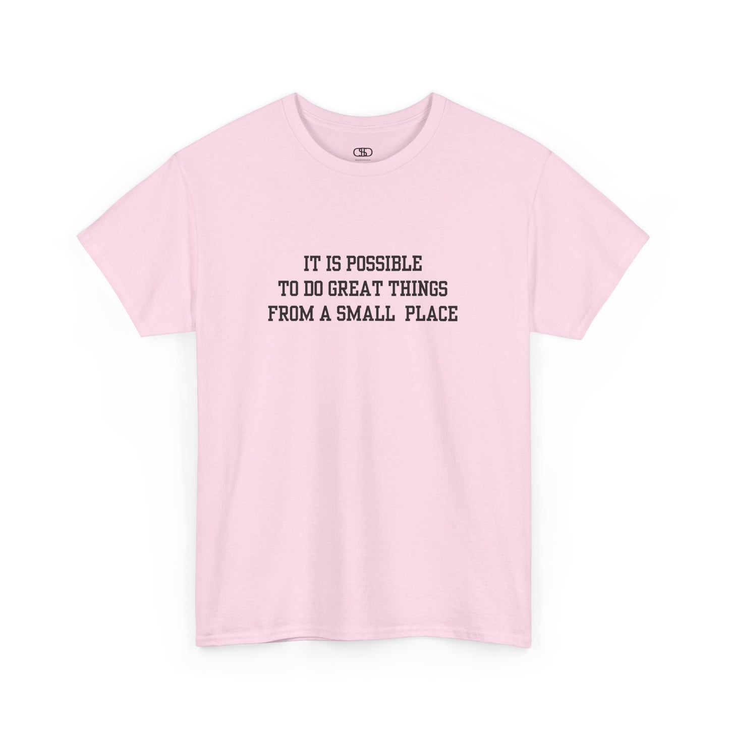 A light pink t-shirt with the quote “It is possible to do great things from a small place” on the front.