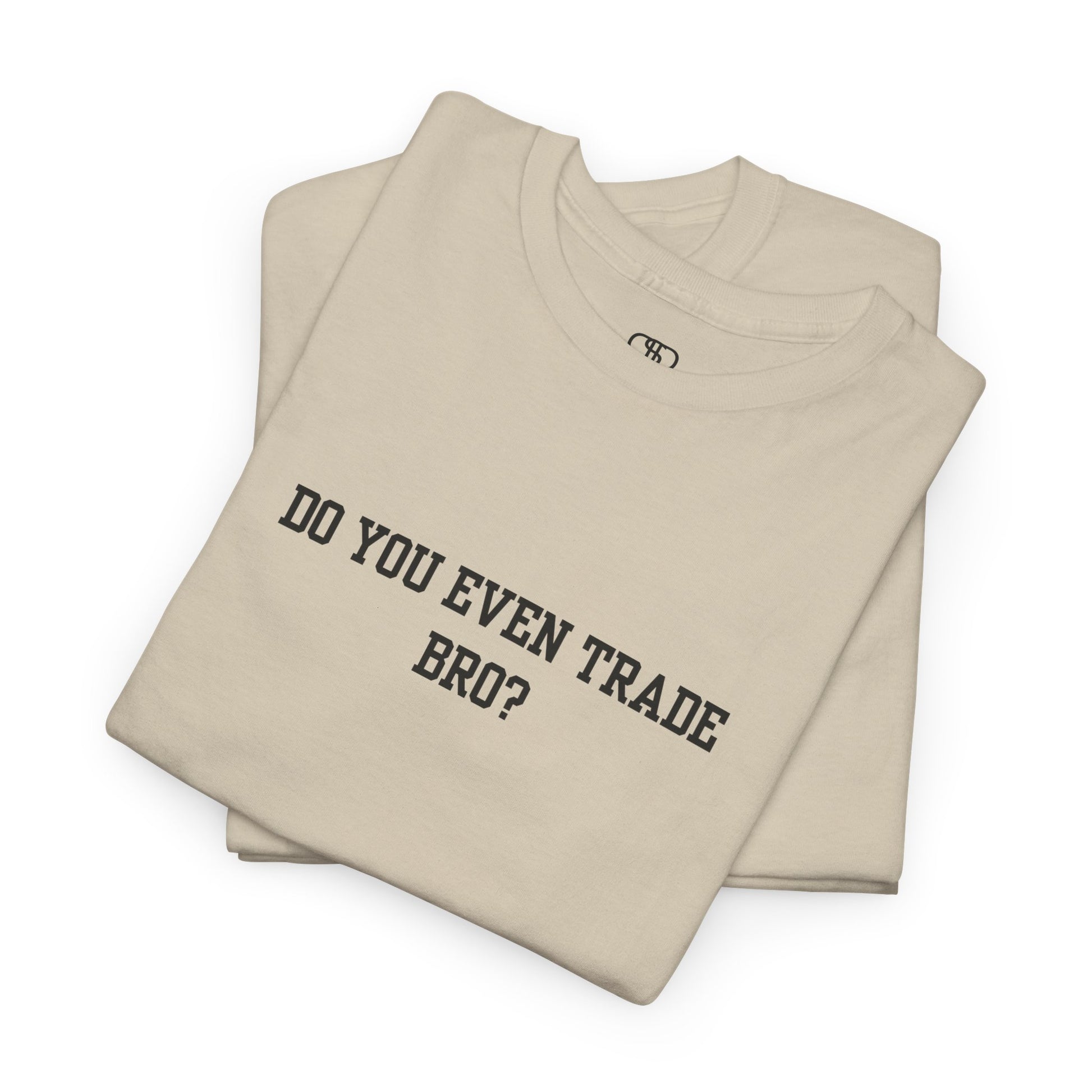 A sand t-shirt with the text "Do You Even Trade, Bro?" prominently displayed on the front. The shirt is shown in a clean, well-lit setting, highlighting the bold and humorous design.