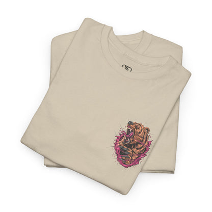 A folded sand T-shirt with a graphic of a raging bear ripping through the fabric, growling, with claws out and red eyes.