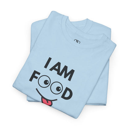 A light blue folded T-shirt with "I AM FOOD" text, where the 'OO' are cartoon eyes, and a tongue-out graphic.