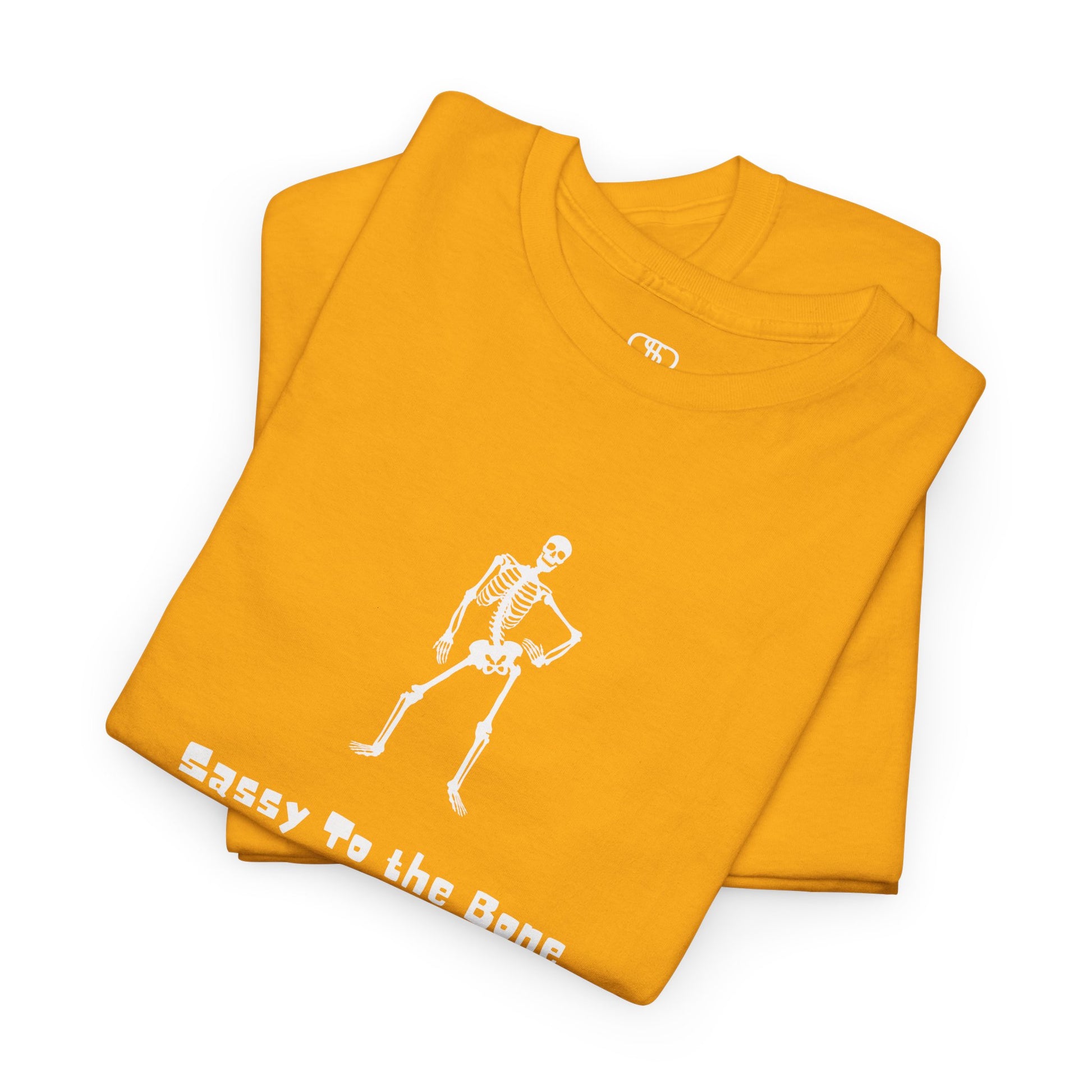 Folded Daisy T-shirt with a sassy skeleton graphic with hands on hips and "Sassy to the Bone" text in a cartoon font.