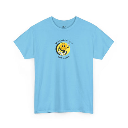 Sky Blue Front of a t-shirt showing a smiling waving emoji with curved text "Remember You Are Alive." The back shows a vibrant, smiling sunflower with the words "Make the Best Out of Everyday."