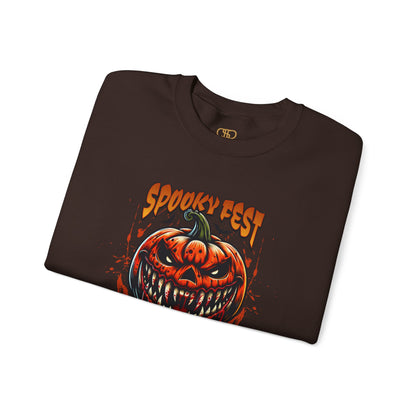 A folded dark brown sweater featuring a Scary fanged jack-o'-lantern with "Spooky Fest Halloween Your Soul Now Belongs To Me!" text, orange and black horror sweatshirt.