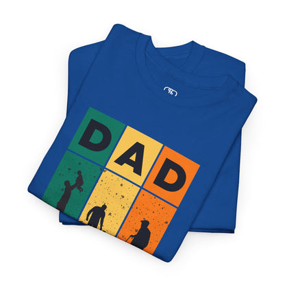 A folded royal blue T-shirt with "DAD" letters, each letter showing a different stage of a father's life (lifting child, walking with child, old age).