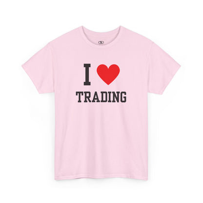 A minimalist light pink t-shirt featuring the "I Love  design with the text "I," a red heart symbol, and the word "Trading" underneath.