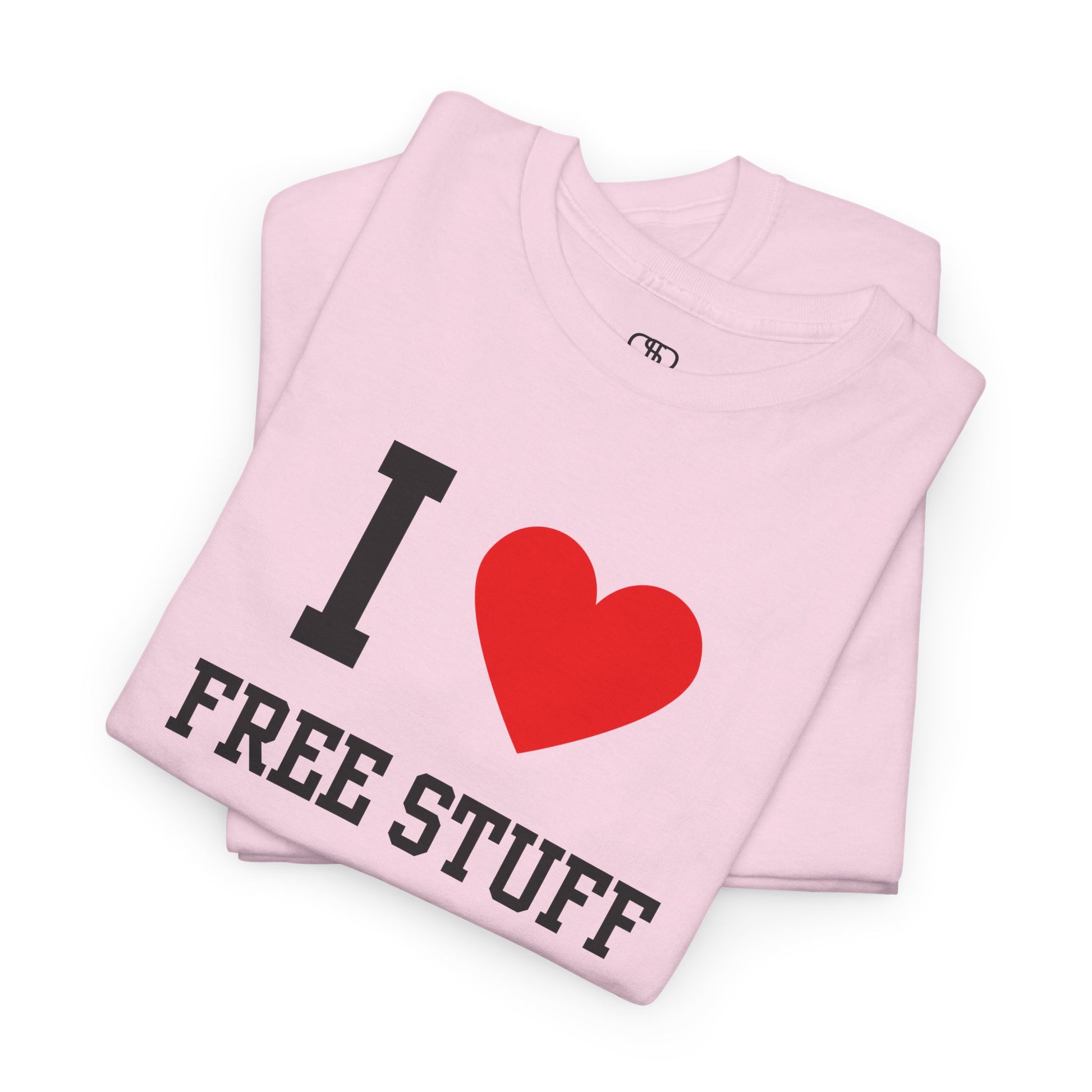 A funny folded light pink t-shirt with the iconic "I Love" design, featuring the text "I," a red heart, and the phrase "Free Stuff" below.
