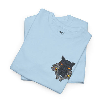 A folded light blue T-shirt with a daring dog graphic biting two skulls, all with glowing molten lava-like eyes.