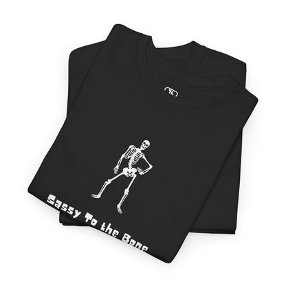 Folded Black T-shirt with a sassy skeleton graphic with hands on hips and "Sassy to the Bone" text in a cartoon font.
