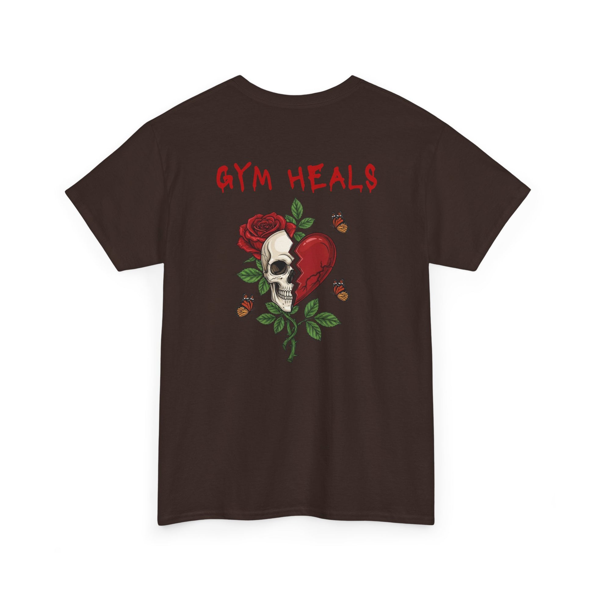 A dark brown t-shirt with a front design of a half skull, half broken heart, and a rose. The back reads "Gym Heals" in red.