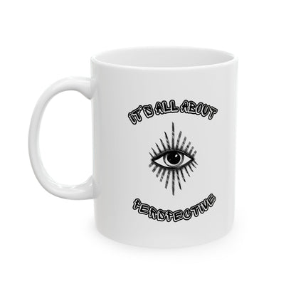 Ceramic mug: 'It’s All About Perspective' text, unique artistic eye design.