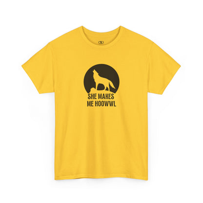 A daisy yellow T-shirt with a wolf silhouette howling at the moon on a cliff, and "She makes me HOOWWL" text.