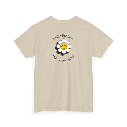 A sand Front of a t-shirt showing a smiling waving emoji with curved text "Remember You Are Alive." The back shows a vibrant, smiling sunflower with the words "Make the Best Out of Everyday."