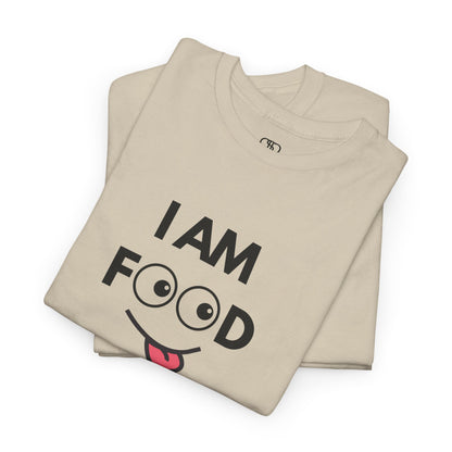 A sand folded T-shirt with "I AM FOOD" text, where the 'OO' are cartoon eyes, and a tongue-out graphic.