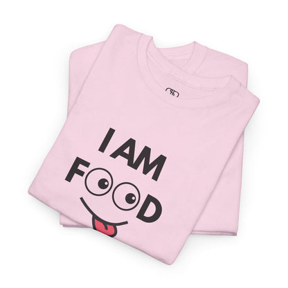 A light pink folded T-shirt with "I AM FOOD" text, where the 'OO' are cartoon eyes, and a tongue-out graphic.