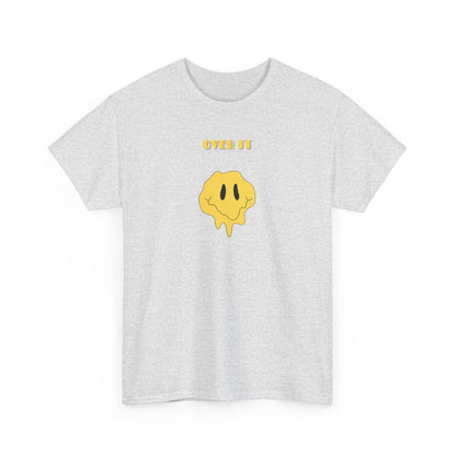 A t-shirt with a graphic of a yellow smiley face emoji melting into a puddle, with the words "Over It" printed below in a bold font.