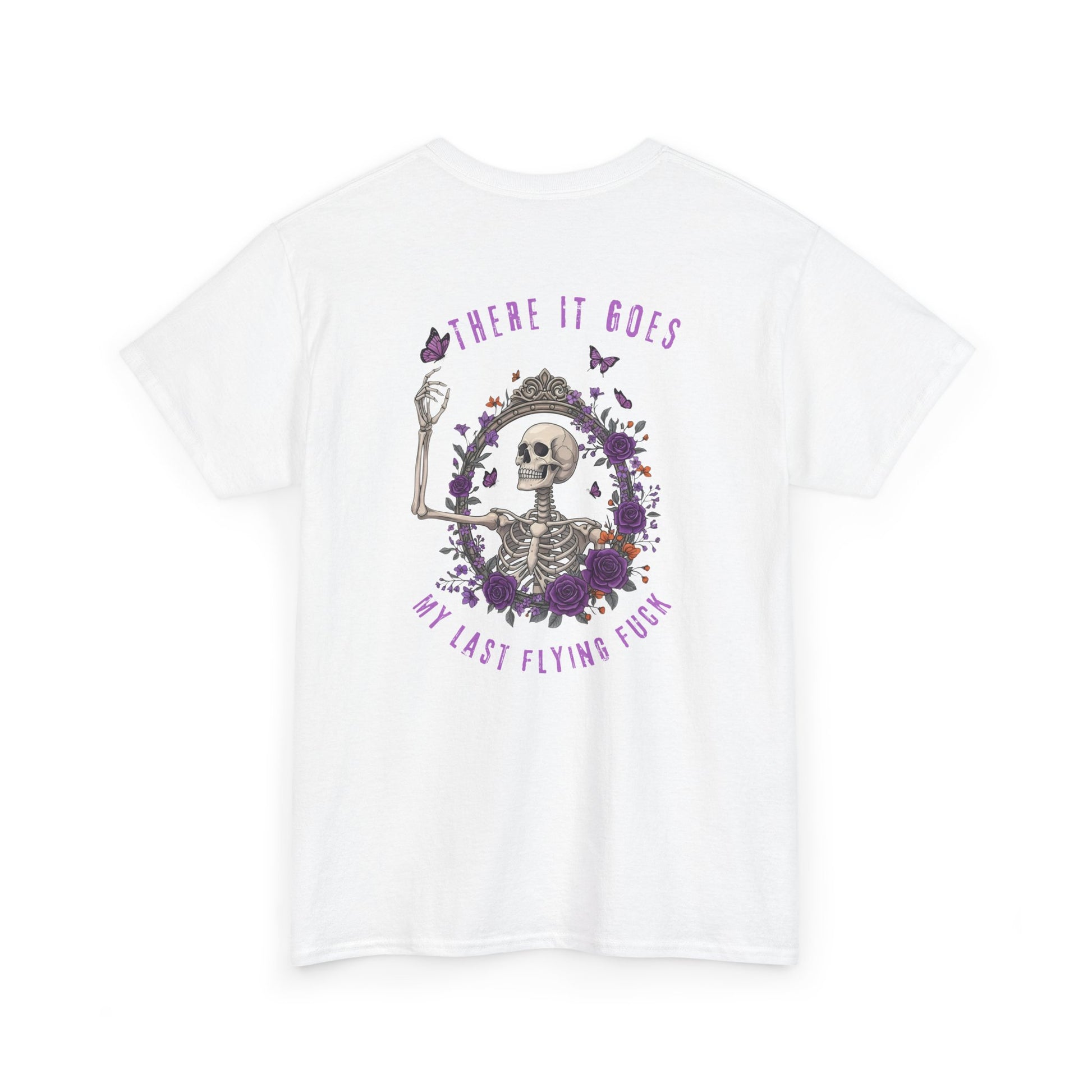 A white t-shirt with a skeleton hand flipping its middle finger on the front surrounded by vines, roses, & butterflies, and a full skeleton design on the back with the phrase “My Last Flying Fuck.”
