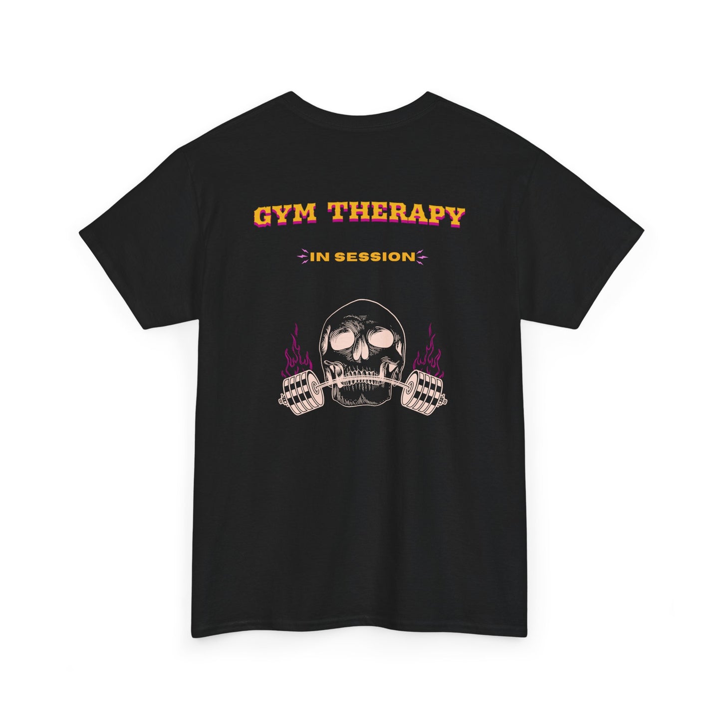 A folded black t-shirt with a skull lifting a barbell on the front and the words “Gym Therapy In Session” with the same skull on the back.