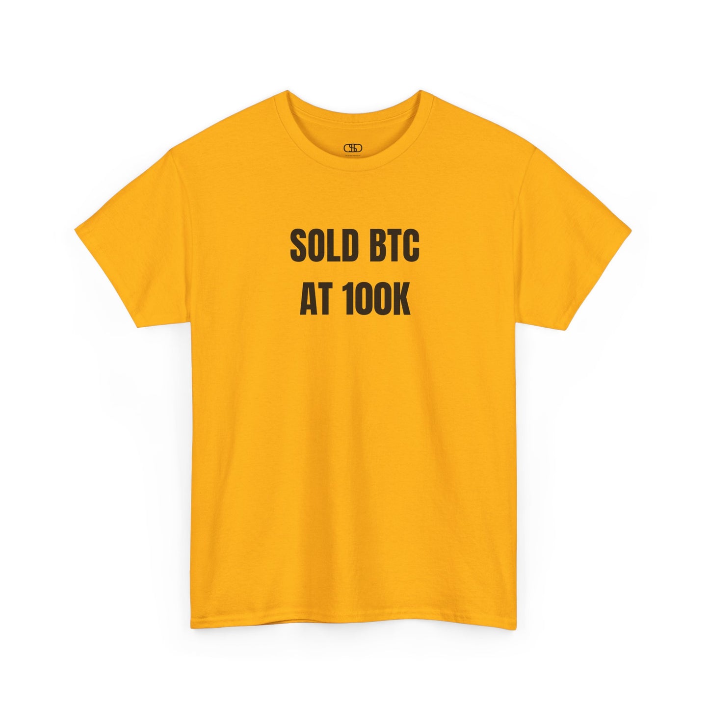 A gold T-shirt with bold text "SOLD BTC At 100K" on the front.