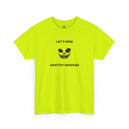 A SAFETY GREEN T-shirt with a daring clown graphic with sharp teeth and scars, and "Let’s Make Haunting Memories" text.