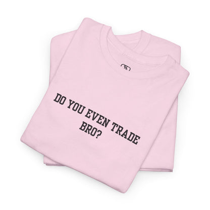 A light pink t-shirt with the text "Do You Even Trade, Bro?" prominently displayed on the front. The shirt is shown in a clean, well-lit setting, highlighting the bold and humorous design.