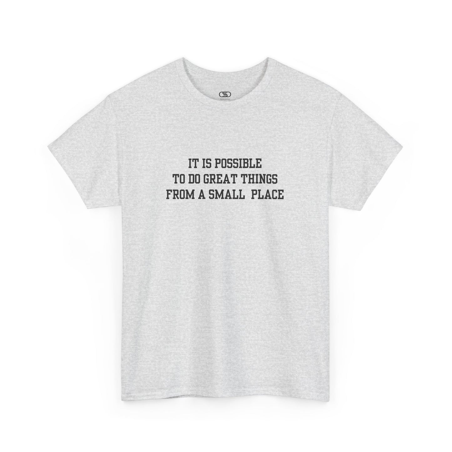 An ash gray t-shirt with the quote “It is possible to do great things from a small place” on the front.