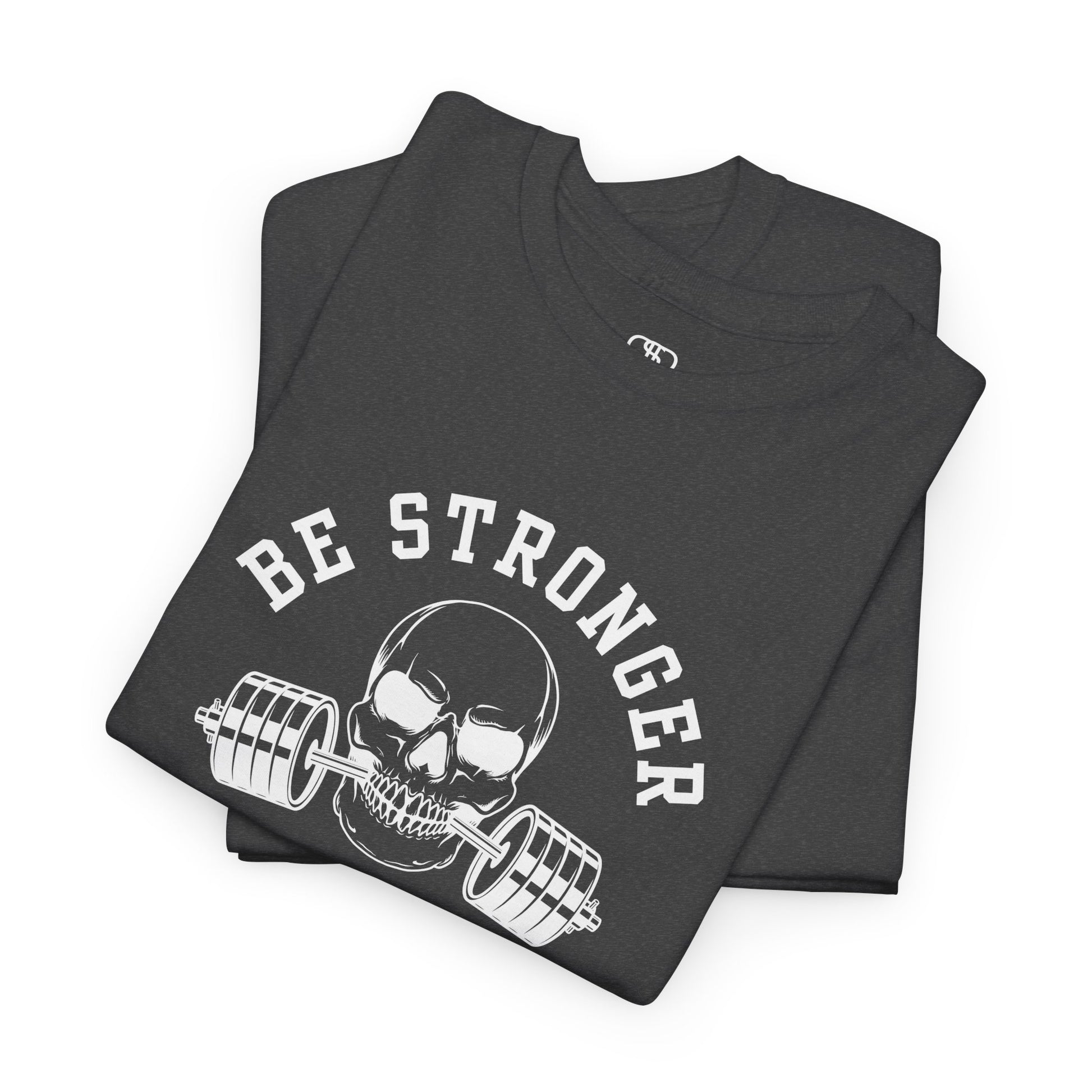  A folded t-shirt in [heather gray] with a skull biting a barbell and the words “Be Stronger Than Your Excuses.”