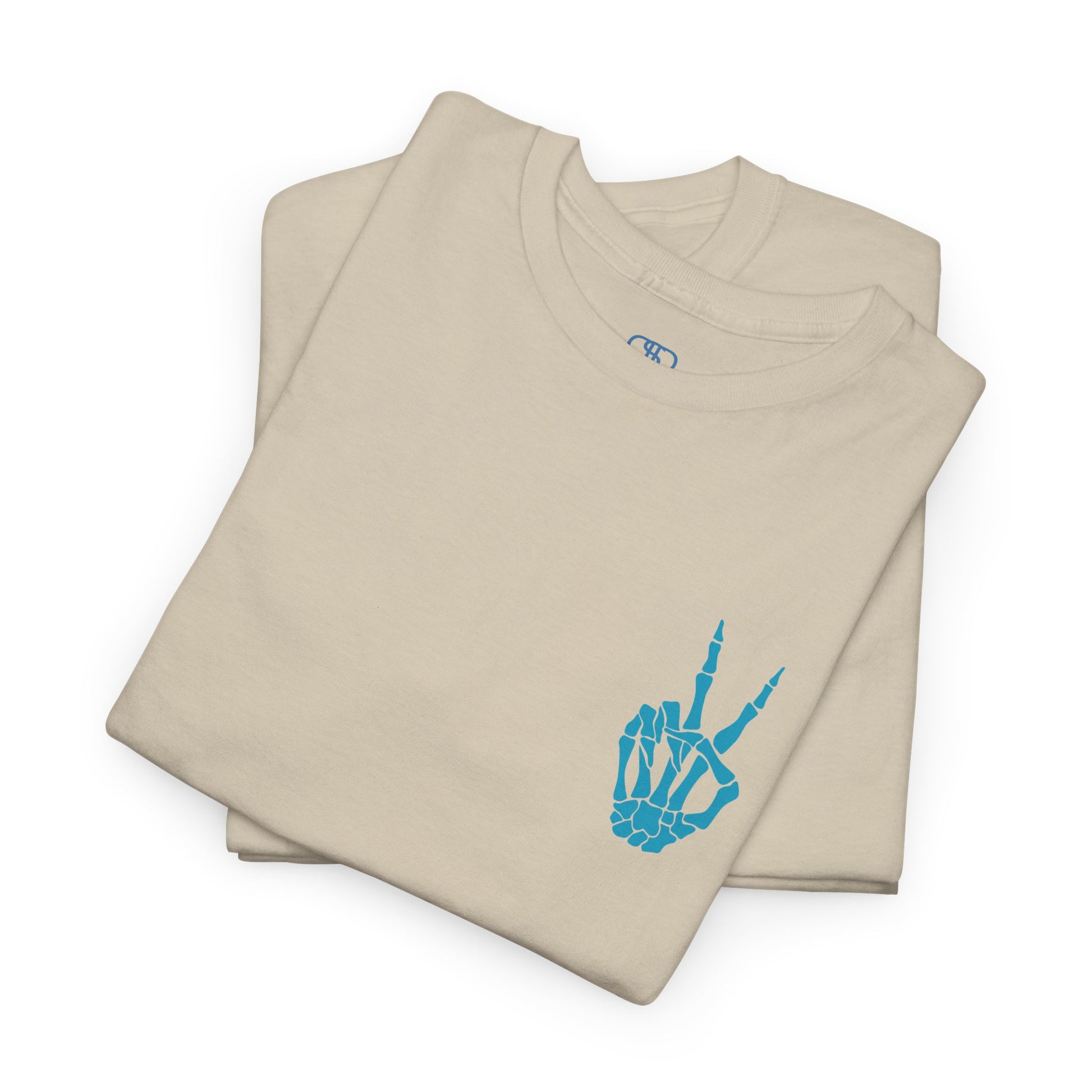 A [folded sand] t-shirt with a skeletal peace sign on the front and the phrase “Have the day you deserve” with a large skeletal peace sign on the back.