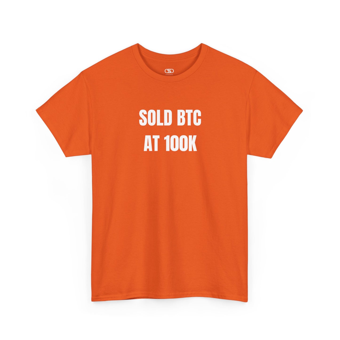 An orange T-shirt with bold text "SOLD BTC At 100K" on the front.