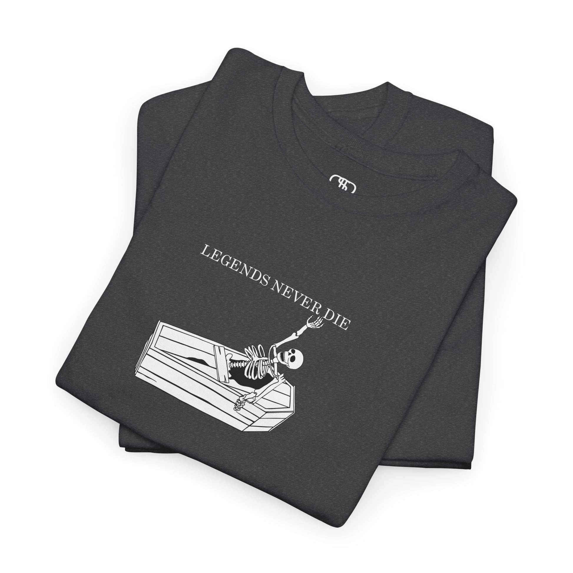 A folded heather gray T-shirt with a skeleton breaking free from a casket, reaching up towards "Legends Never Die" text.