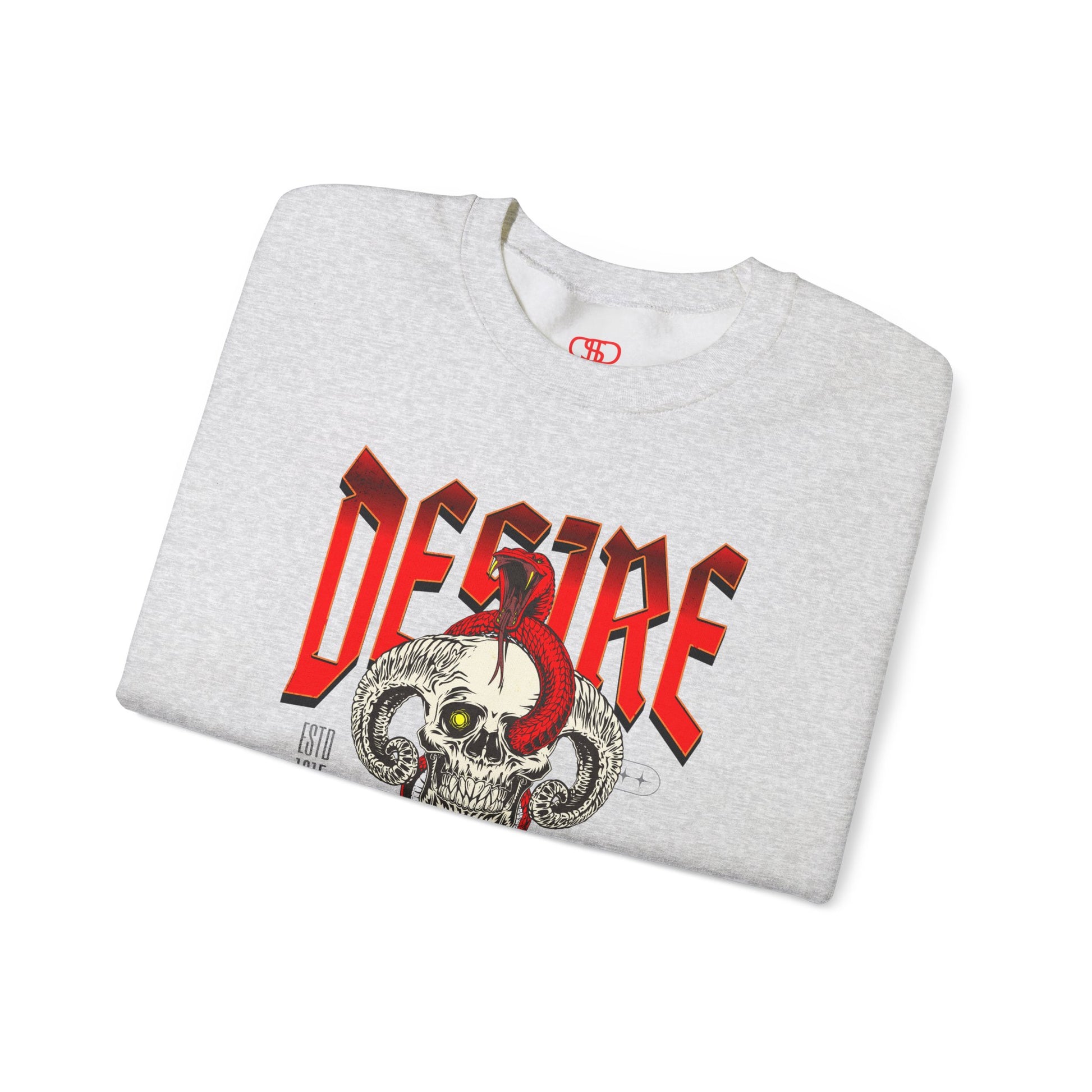 A folded ash gray sweatshirt Horned skull with glowing eye and red snake wrapped around it, "Desire Death's Touch" text, gothic sweatshirt design.