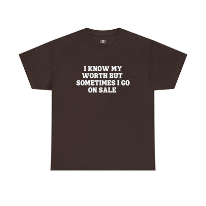 A [dark brown] t-shirt with the funny quote "I know my worth but sometimes I go on sale" printed in a clean, black font across the chest.