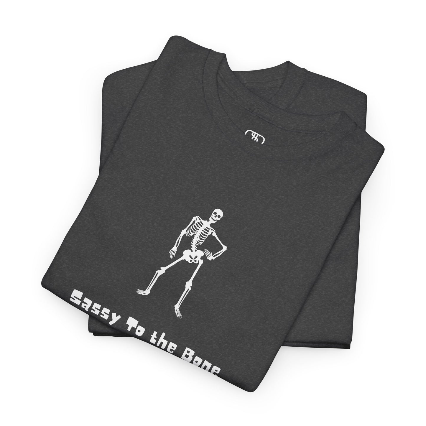 Folded Heather Gray T-shirt with a sassy skeleton graphic with hands on hips and "Sassy to the Bone" text in a cartoon font.