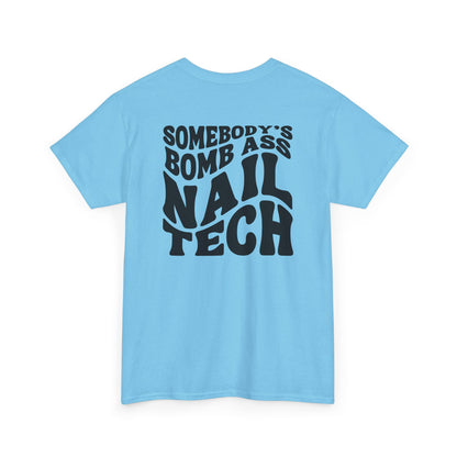 Back design on a sky blue t-shirt featuring the words somebody's Bomb Ass Nail Tech in a wavy font style. 