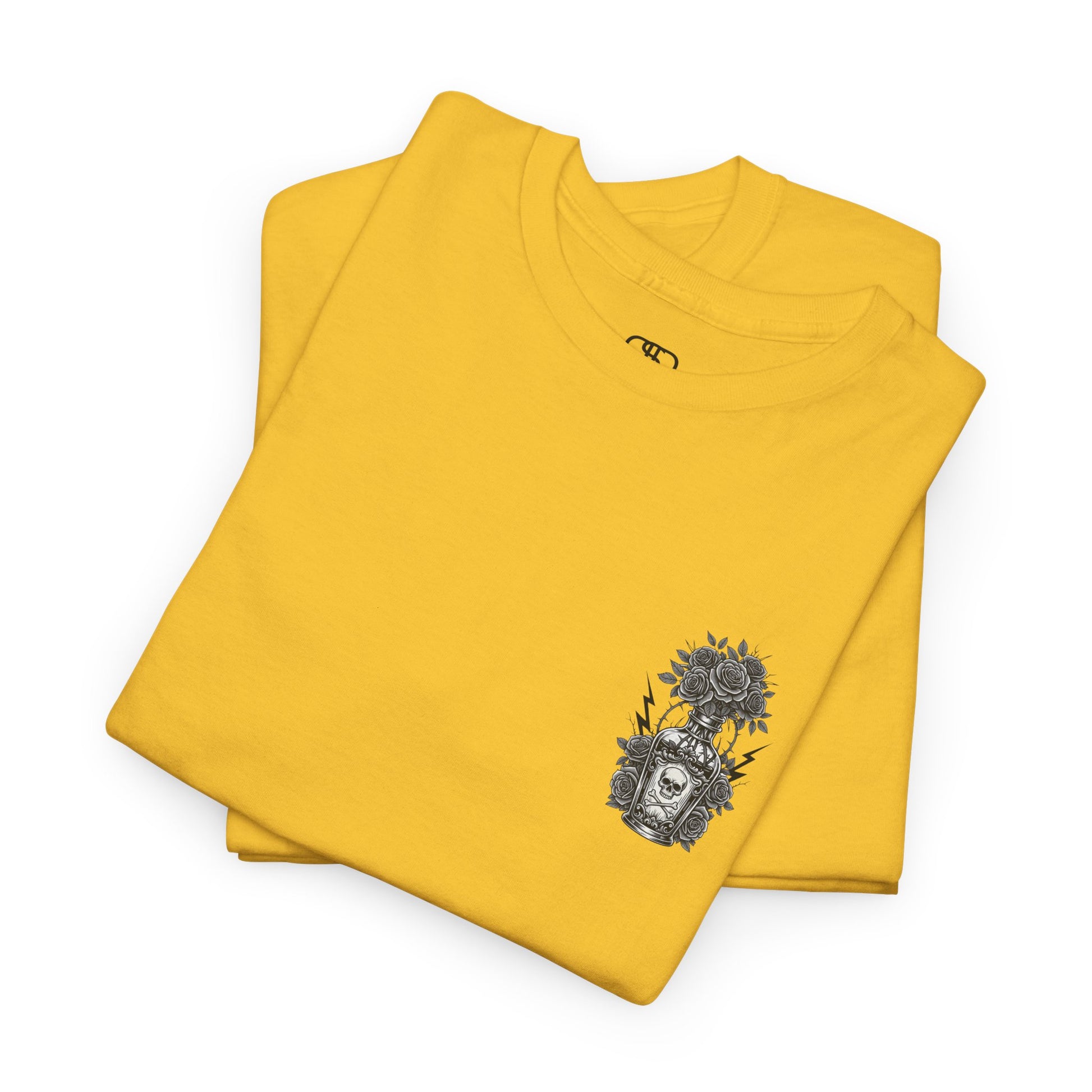 A daisy t-shirt with a skull and crossbones vase filled with roses and the words “Surviving Purely Out of Spite” in a gothic font.