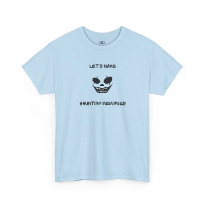 A Light blue T-shirt with a daring clown graphic with sharp teeth and scars, and "Let’s Make Haunting Memories" text.