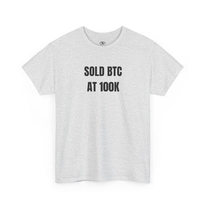 An ash gray T-shirt with bold text "SOLD BTC At 100K" on the front.