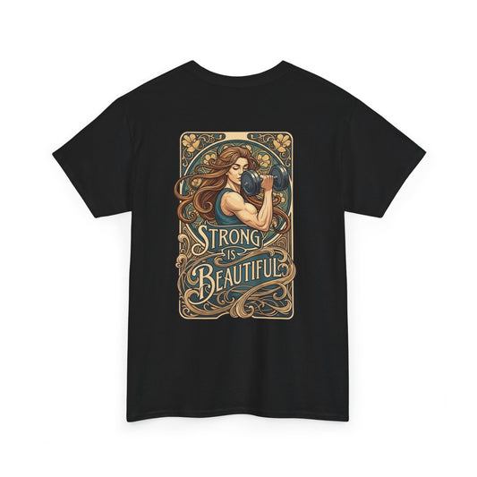 An Art Nouveau style illustration on the back of a t-shirt, featuring a strong woman with flowing brown hair curling a dumbbell. Below her, the words "Strong is Beautiful" are written in an elegant, stylized font, framed by intricate floral and line work.