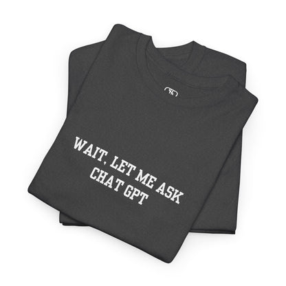 A [folded heather gray] t-shirt with the phrase “Wait, Let me ask Chat Gpt.” on the front.