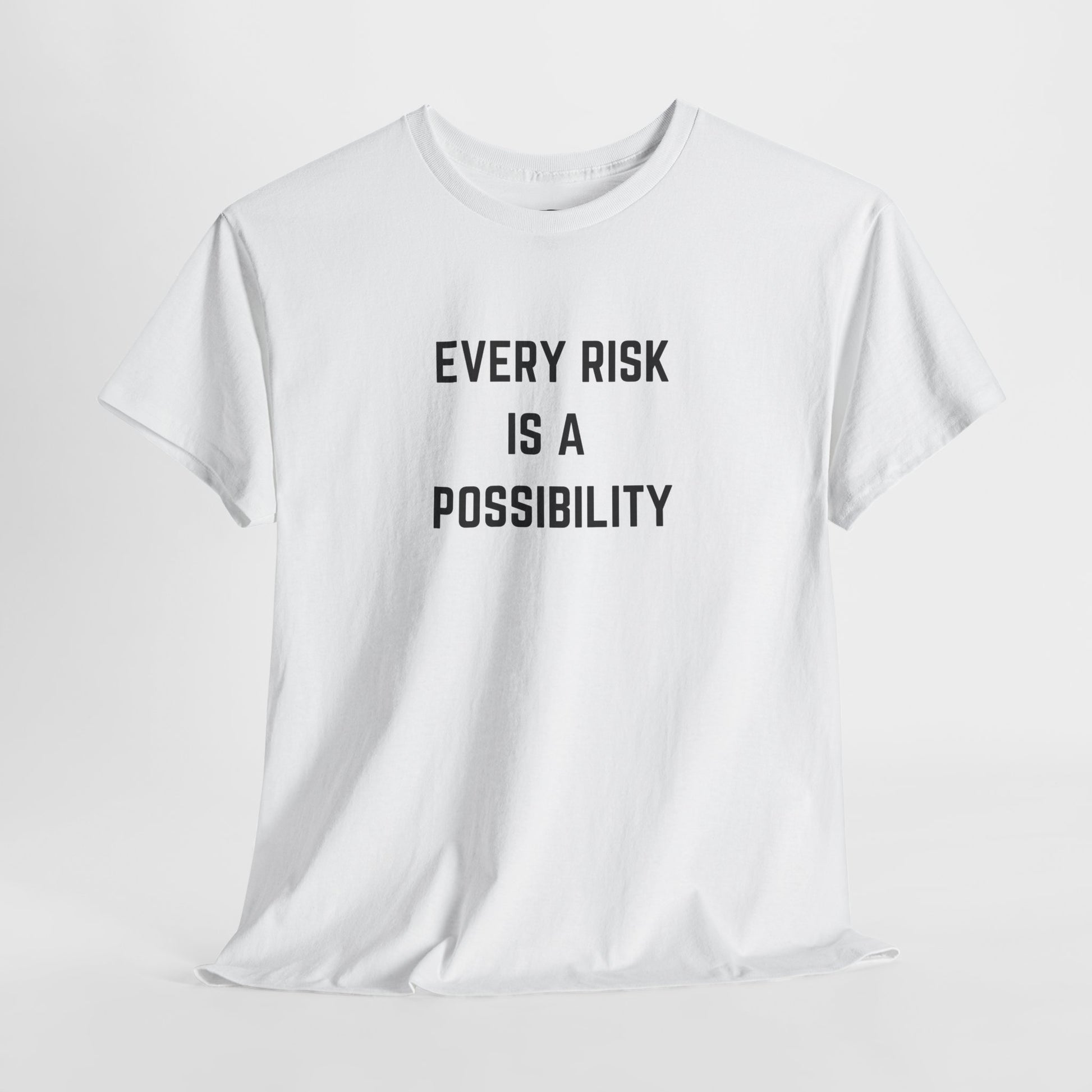  A t-shirt featuring the motivational quote "Every Risk Is a Possibility." in a clean, bold font.