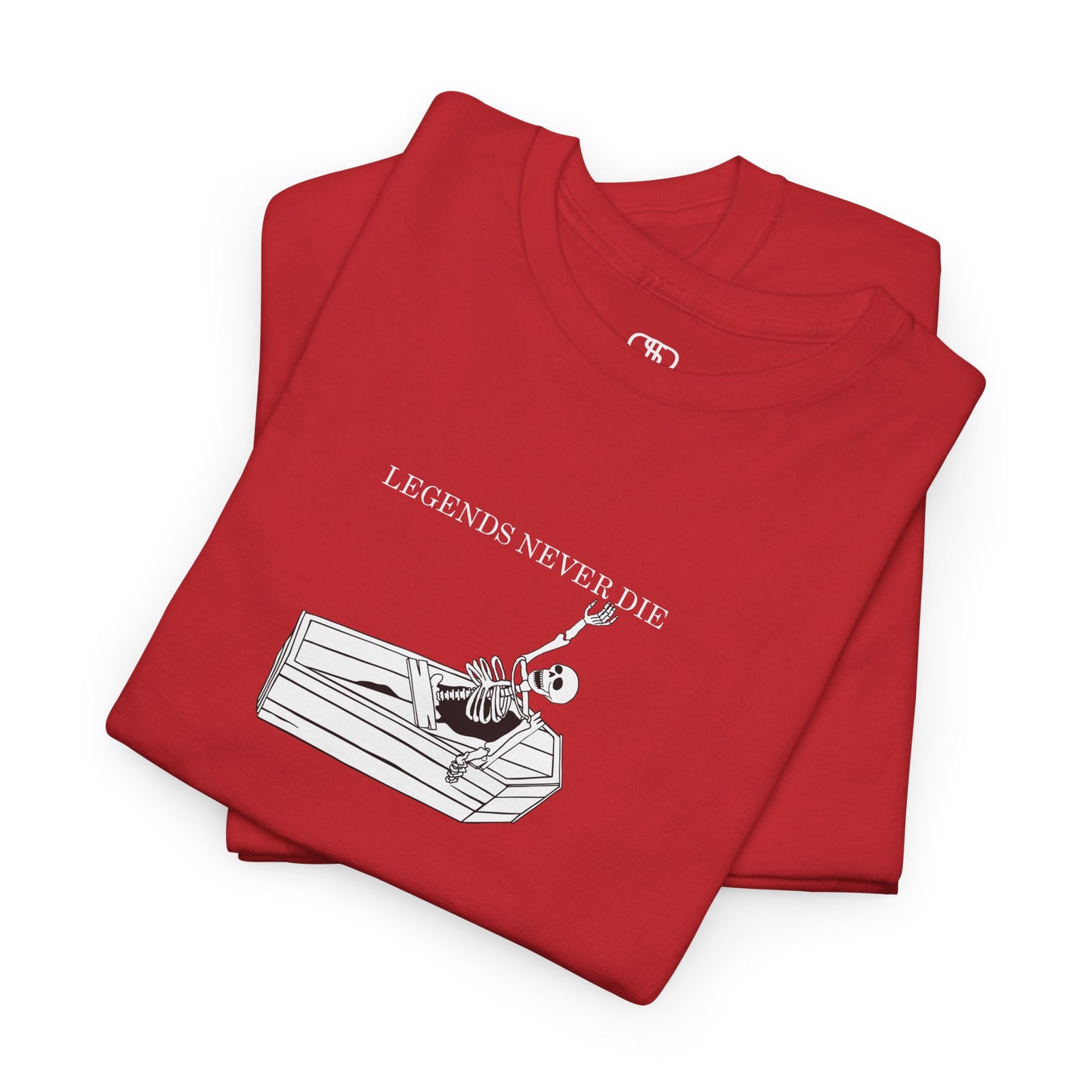 A folded red T-shirt with a skeleton breaking free from a casket, reaching up towards "Legends Never Die" text.