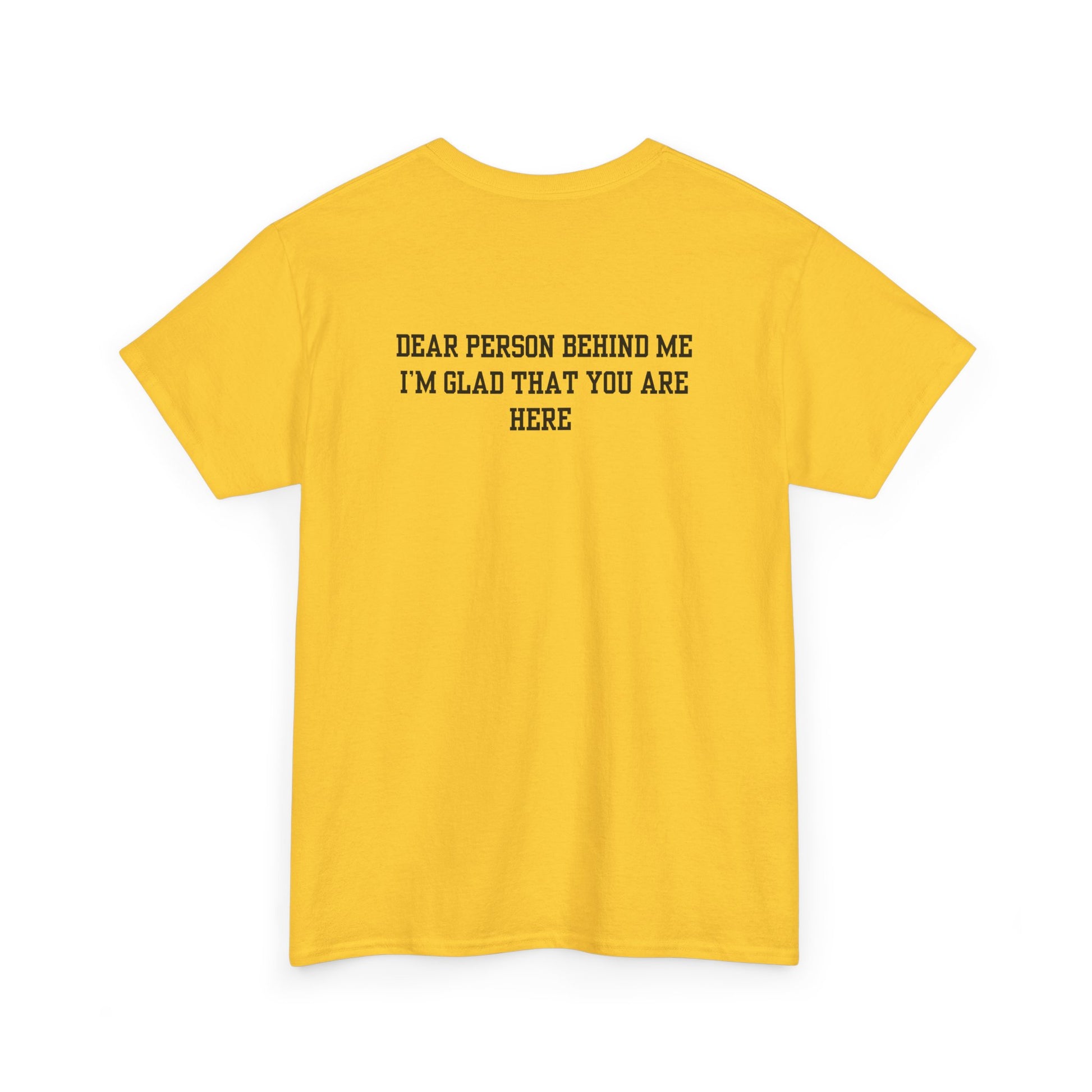 A folded daisy t-shirt with a smiling sunflower and the words “Make the best out of Everyday” on the front and “Dear Person behind me, I’m glad that you are here” on the back.